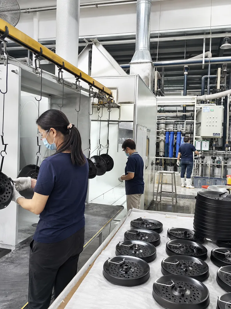 Low-VOC powder coating line and environmental compliance systems at ASCLighting factory