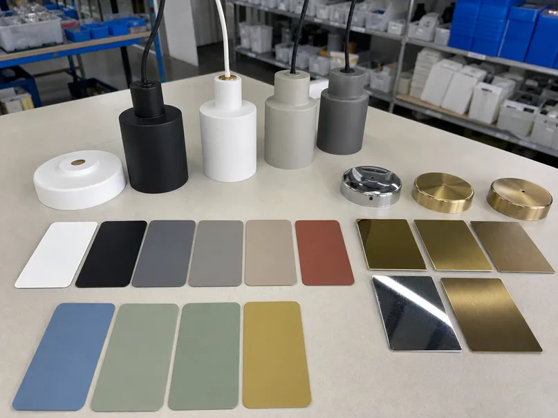 Custom finish samples for bedroom lighting fixtures including powder-coated RAL colors and PVD metallic finishes