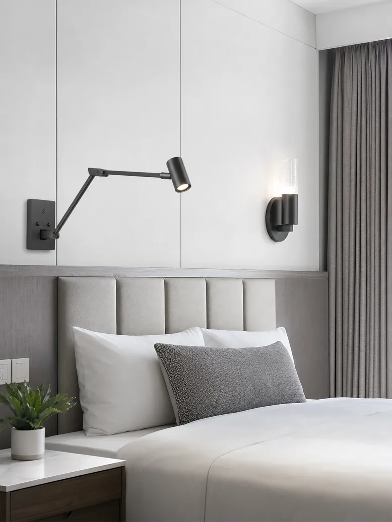 Bedroom wall sconces in die-cast aluminum with adjustable arm configurations for bedside reading and ambient accent lighting