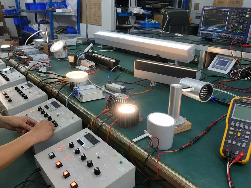Dimmer compatibility testing setup for hotel lighting fixtures with various control protocols