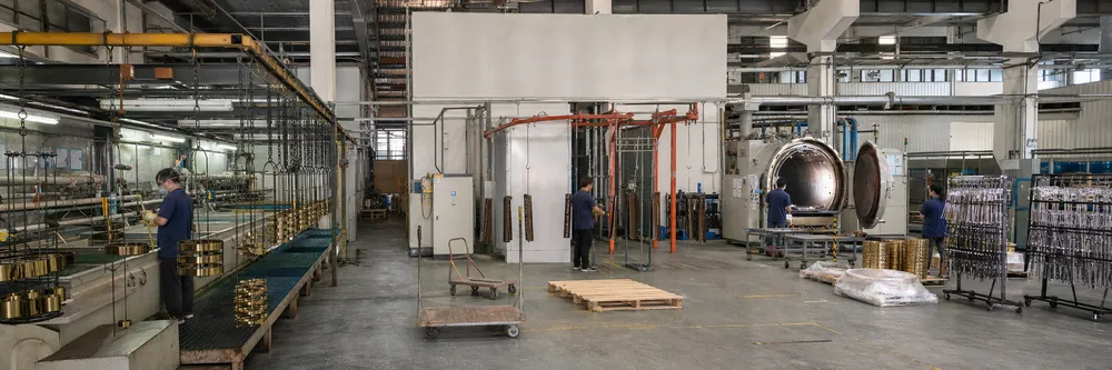 In-house surface finishing production line showing electroplating, powder coating, and PVD stations under one roof