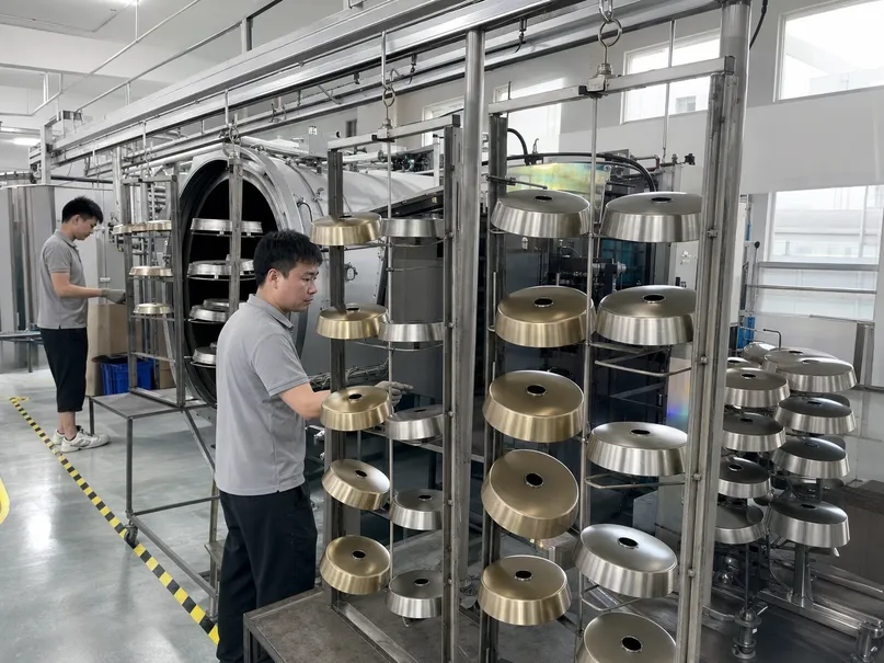 PVD surface finishing line for decorative ceiling lighting housings