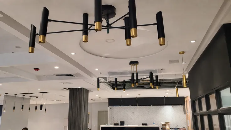 Decorative ceiling lighting in restaurant and retail commercial fit-out
