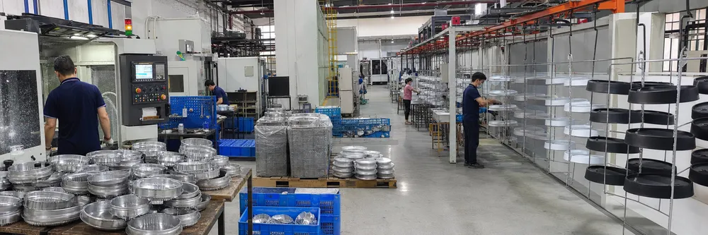 CNC machining and automated powder coat finishing line for ceiling lighting housings at ASCLighting factory
