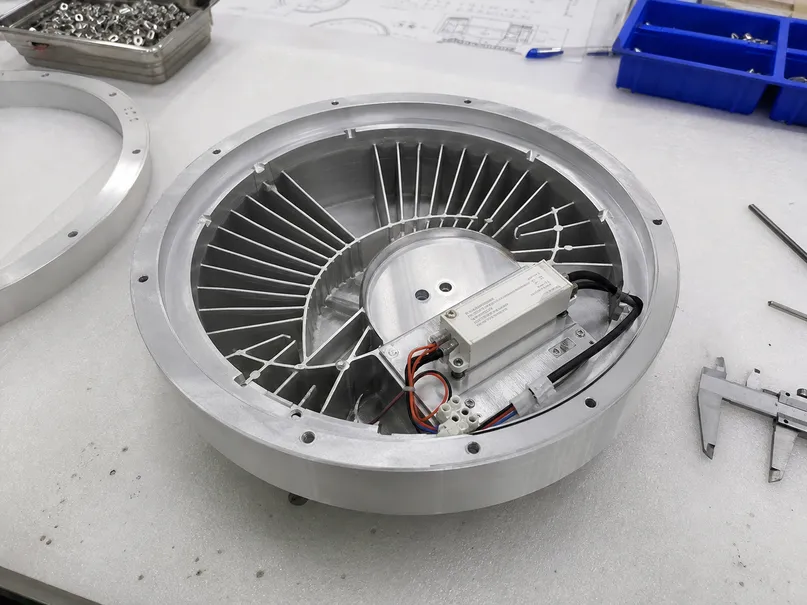 CNC-machined ceiling light prototype with provisional surface finishing and integrated driver