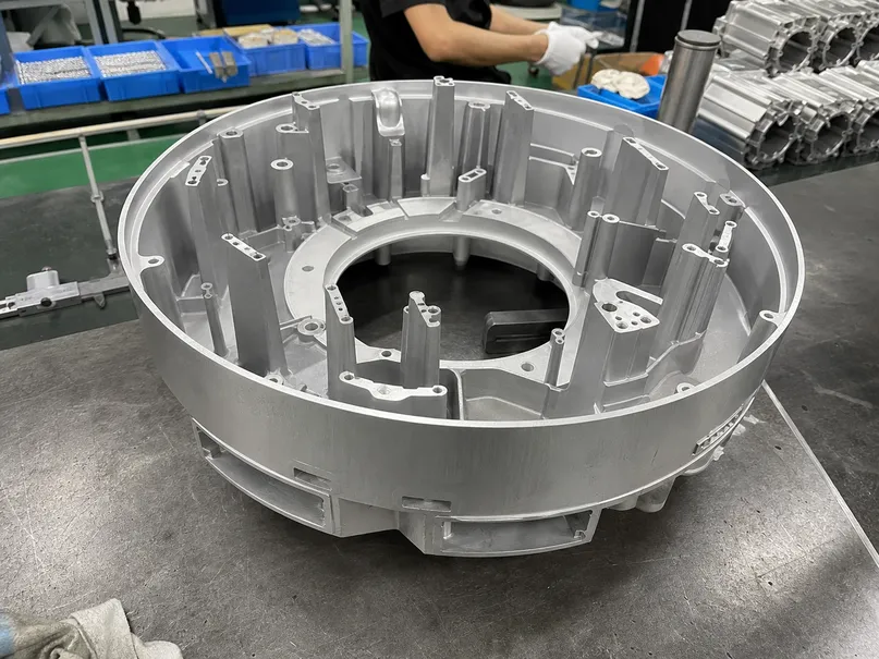 Die-cast aluminum ceiling light housing showing precision machining and complex profile geometry