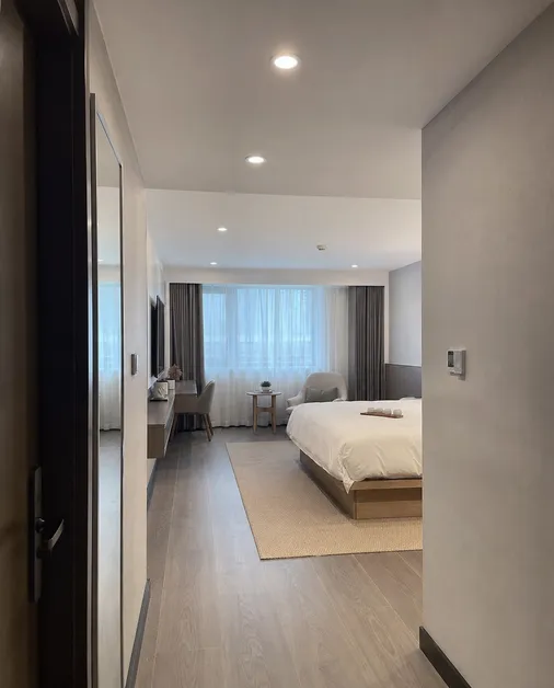 Recessed ceiling lighting in hotel corridor and guest room application