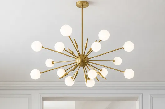 Mid-century modern chandelier pendant with sputnik-style arms and brushed gold finish