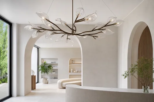 Organic nature-inspired chandelier pendant with branch-like arms and leaf-shaped glass shades