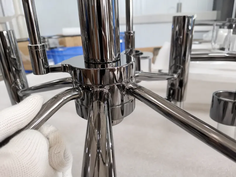 PVD finish quality closeup on chandelier pendant lighting showing molecular-level bonding