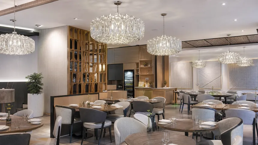 Chandelier pendant lighting in restaurant dining room fit-out