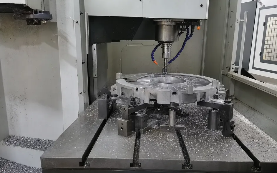 Die-cast aluminum chandelier housing being CNC machined at ASCLighting facility