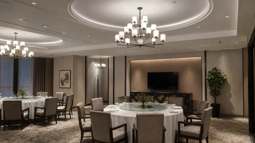 Dining room chandeliers installed in a hotel private dining setting, showing multi-unit project deployment
