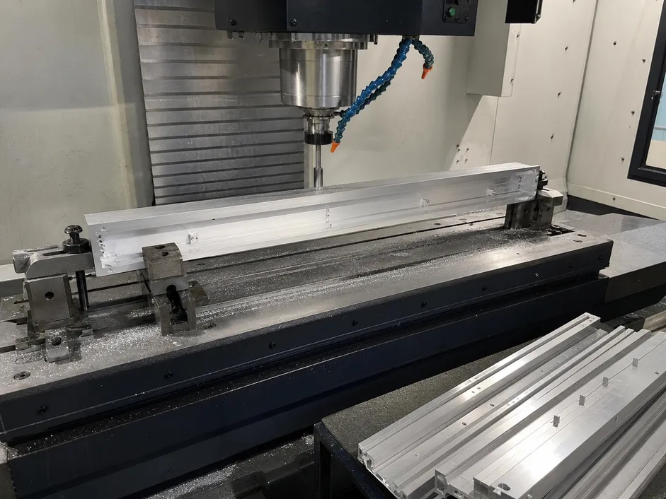 CNC machining aluminum alloy housing for linear chandelier lighting with ±0.1mm tolerance