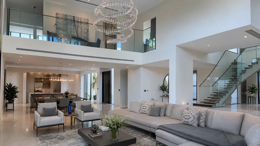 Luxury chandelier in a premium residential villa setting with high ceilings and contemporary interior design