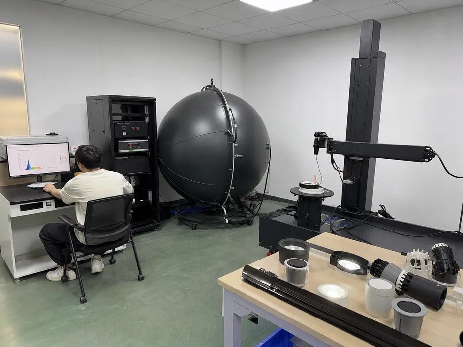 In-house photometric testing lab with integrating sphere and goniophotometer for architectural lighting quality control