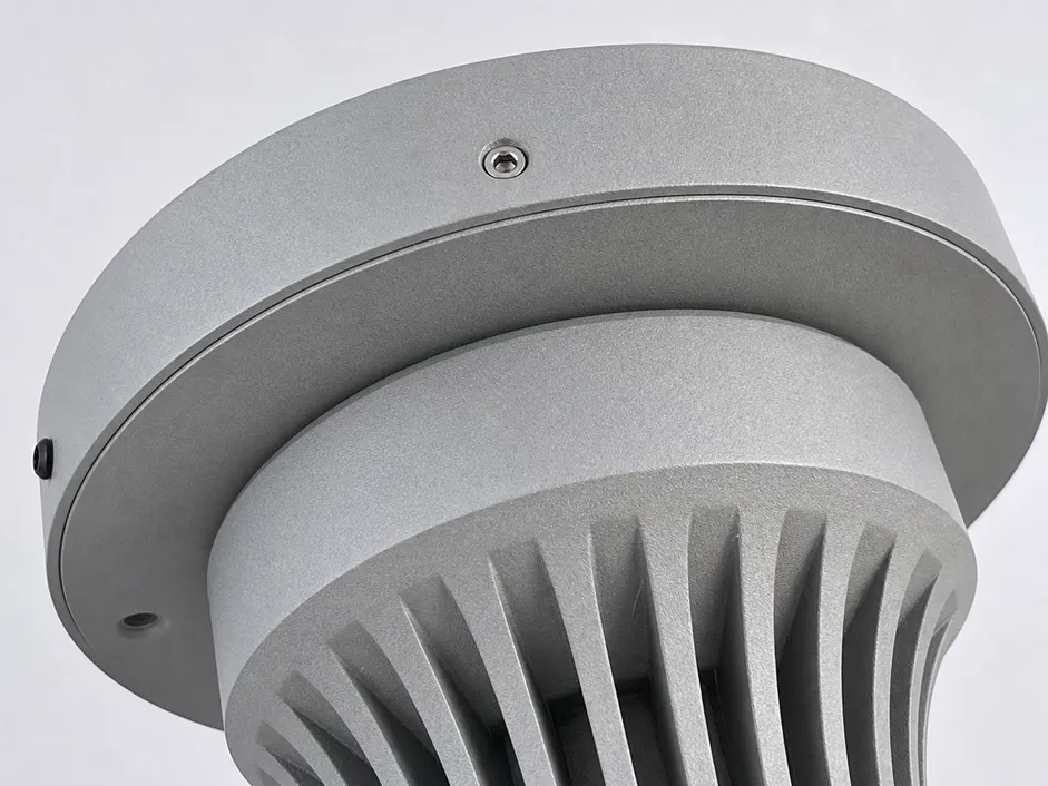 Close-up of ADC12 aluminum die-cast housing showing clean machined edges and flush canopy mounting interface