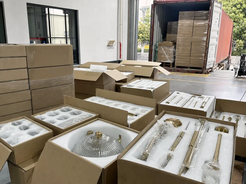 Luxury lighting fixtures in custom foam-lined export packaging ready for container loading