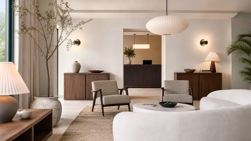 Boutique hotel interior with minimalist lighting that photographs well for design-conscious guests