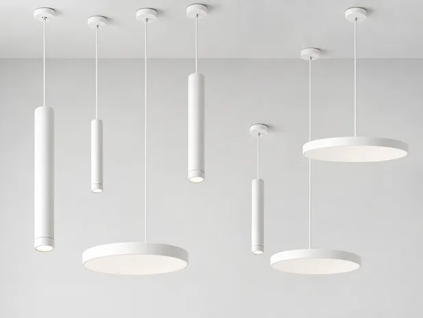 Minimalist pendant lighting in cylinder and disc profiles with matte white finish