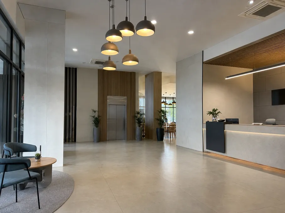 Modern pendant lighting installed in a boutique hotel lobby with clean architectural lines