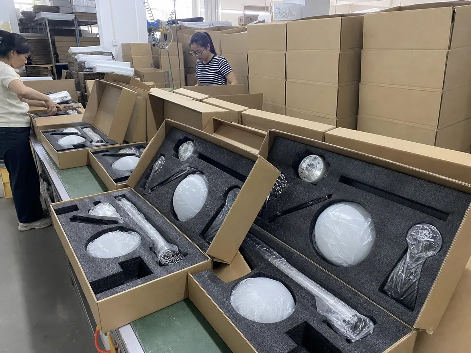 Custom foam-lined packaging for Modern collection pendant fixtures showing precision-cut foam profiles