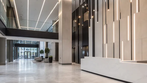 Custom architectural lighting in a commercial tower lobby