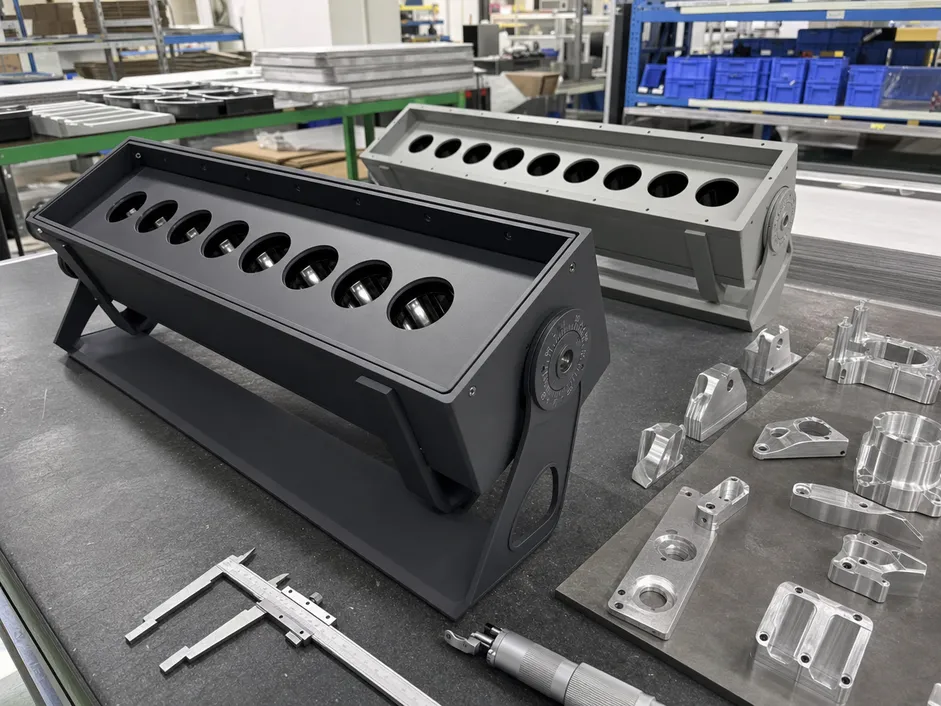 Custom architectural luminaire manufactured from die-cast aluminum with precision CNC-machined mounting components