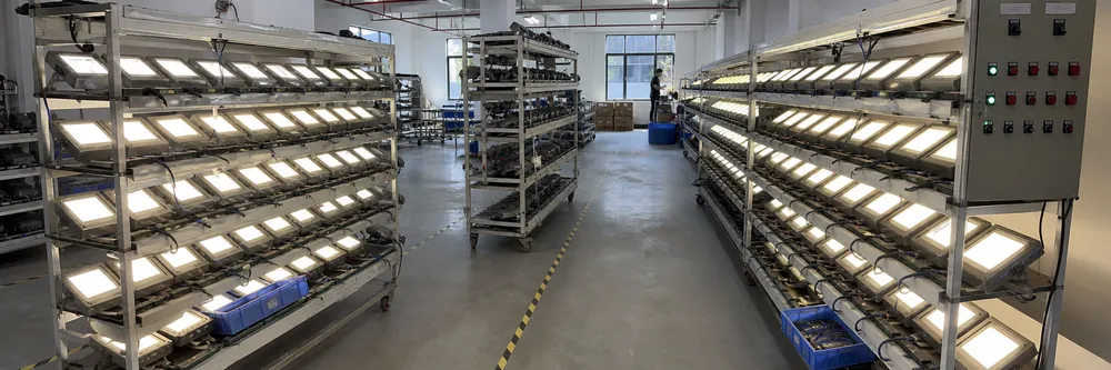 Architectural lighting fixtures undergoing 100% aging test on powered burn-in racks before shipment