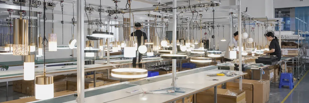 Custom pendant lighting fixtures undergoing 100% aging test on the production line