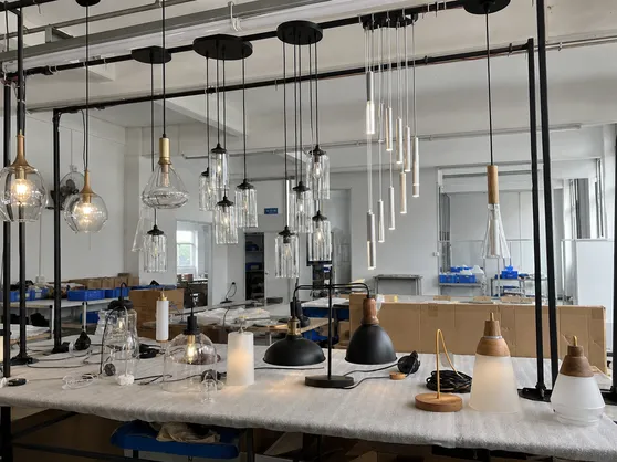 Pendant lighting collection — modern minimalist, glass, cluster, staircase, industrial, and wood variants