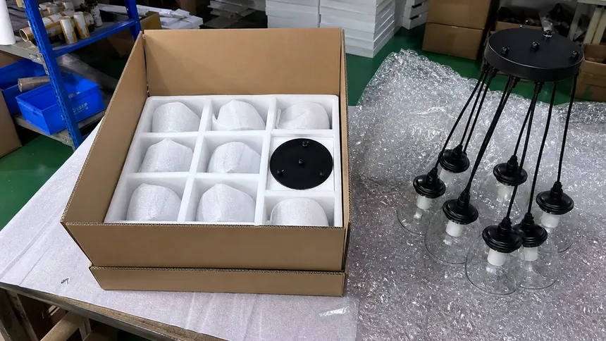 Cluster pendant fixture with protective packaging for e-commerce shipping
