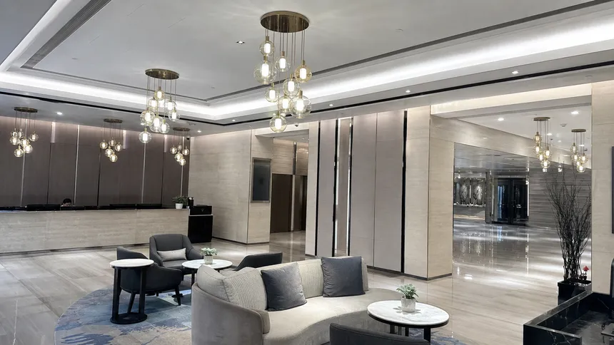 Cluster pendant fixtures installed in a hotel lobby renovation project