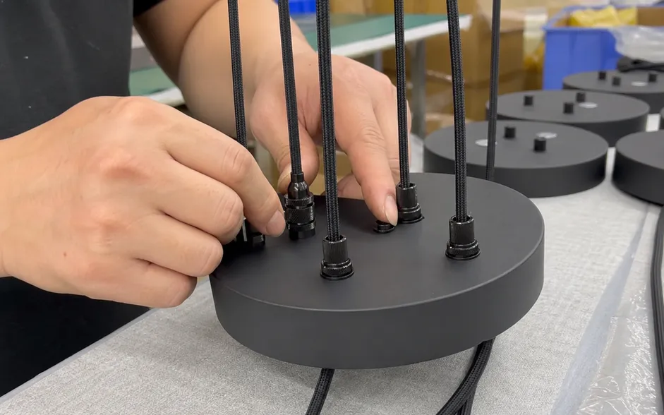 Locking collar cord length adjustment system at canopy entry point for cluster pendant installation