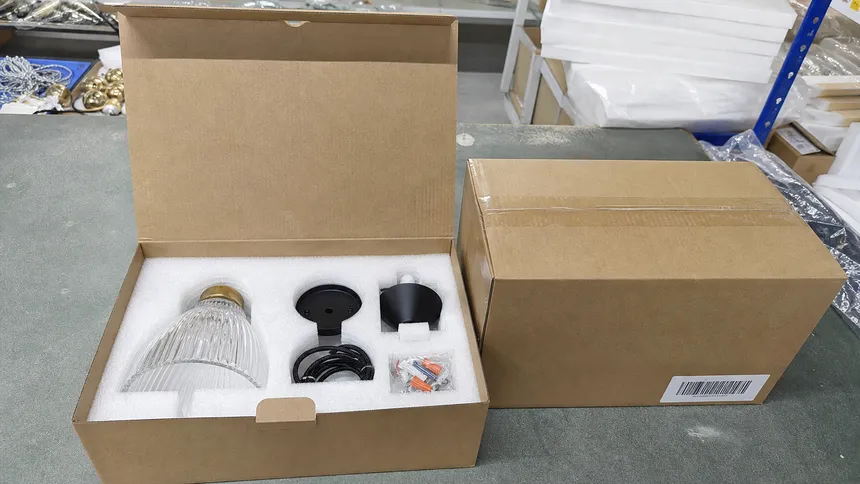 Entryway pendant lighting with mail-order packaging showing foam-lined carton and FNSKU labeling