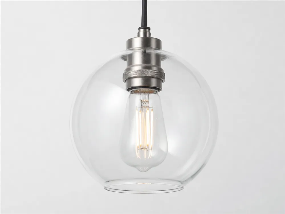 Clear glass pendant shade showing filament LED bulb visible through transparent glass
