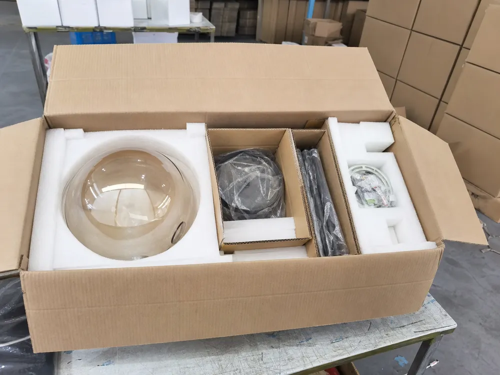 Glass pendant lighting export packaging with foam-lined inner cartons and separated components