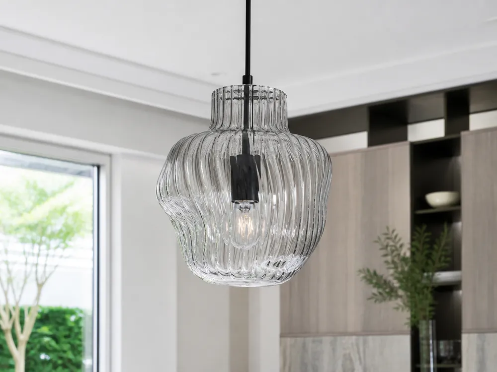 Mouth-blown glass pendant showing irregular handcrafted character for luxury applications