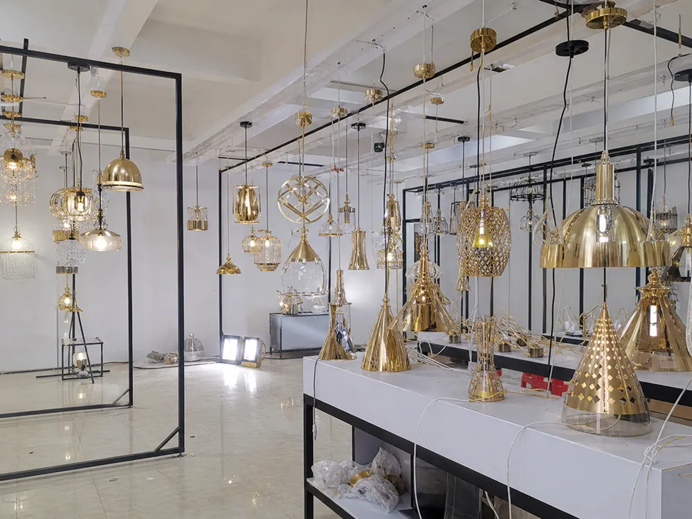 ASCLighting factory showroom displaying gold pendant lighting samples ready for wholesale evaluation