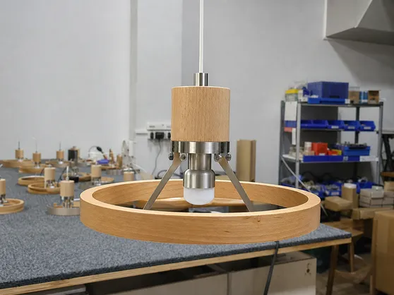 Wood pendant lighting with natural wood elements and metal hardware