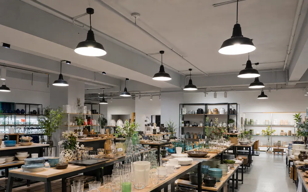 Industrial pendant lighting in retail showroom space