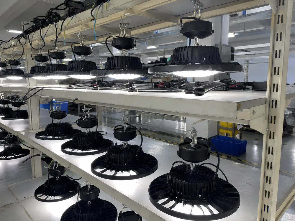 Integrated LED pendant lighting undergoing 100% aging test — burn-in period to catch thermal-related driver failures before shipping