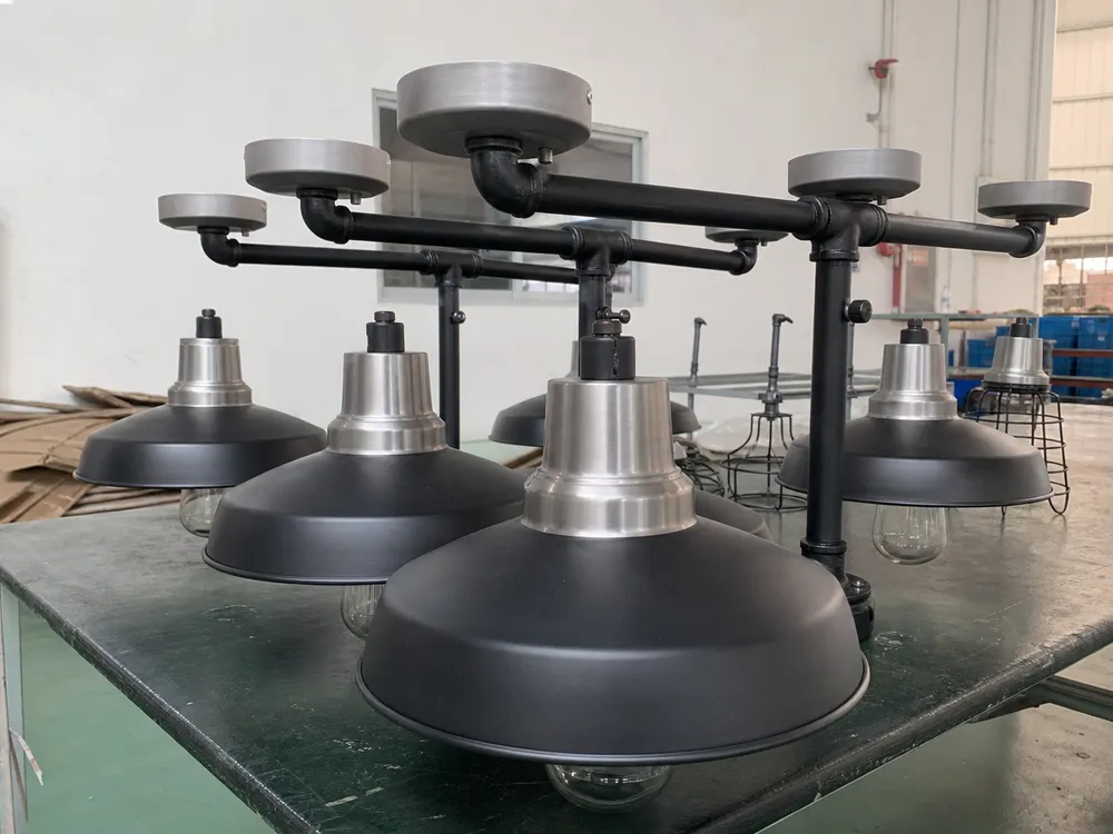 Industrial pendant lighting pipe arm configuration with exposed bulb