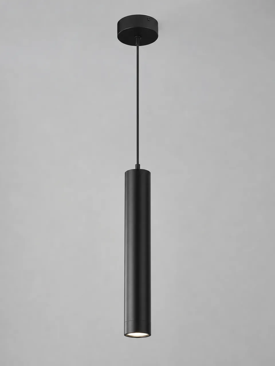 Modern pendant lighting — clean geometric aluminum housing with matte black finish