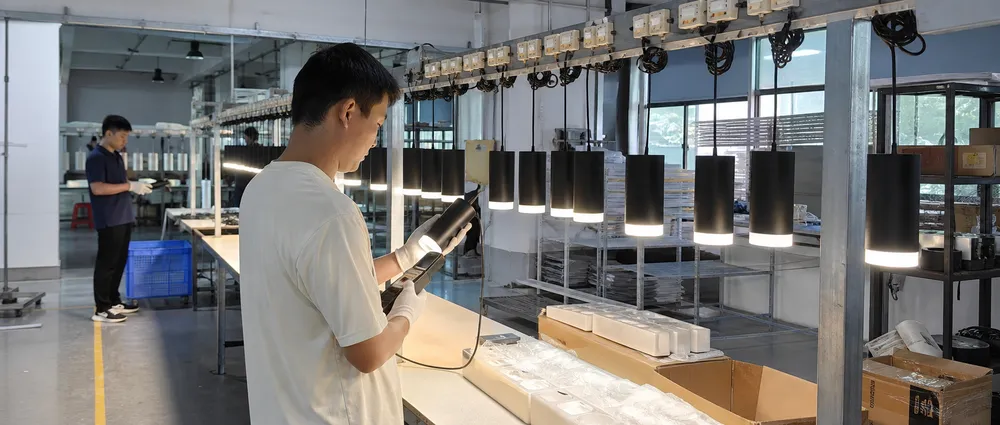 Quality control and burn-in testing process for modern pendant lighting fixtures at ASCLighting factory