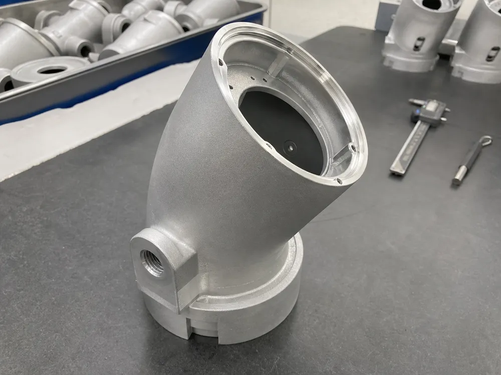 ADC12 die-cast aluminum ceiling spotlight housing showing machined gimbal seat and mounting boss