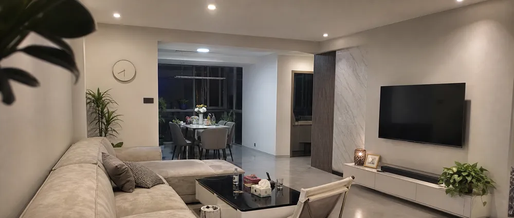 Ceiling spotlights with wide beam angle providing ambient lighting in residential living room