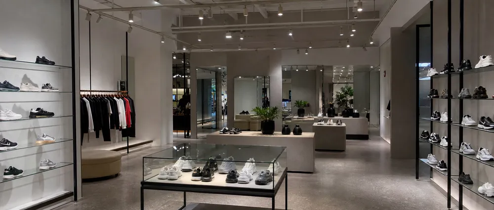 Ceiling spotlights providing tight beam accent lighting in retail merchandise display