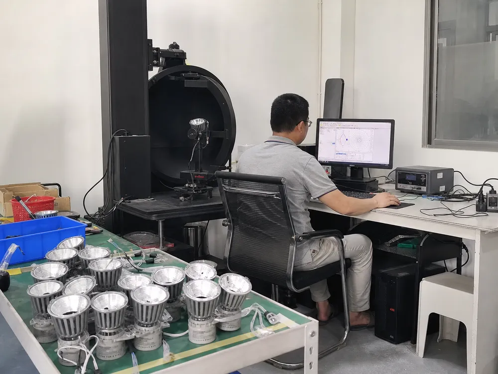 In-house optical lab running photometric verification on LED spotlight production samples