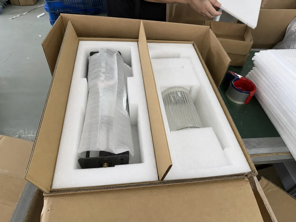 Foam-lined inner carton packaging for hallway wall sconces showing multi-layer protection system
